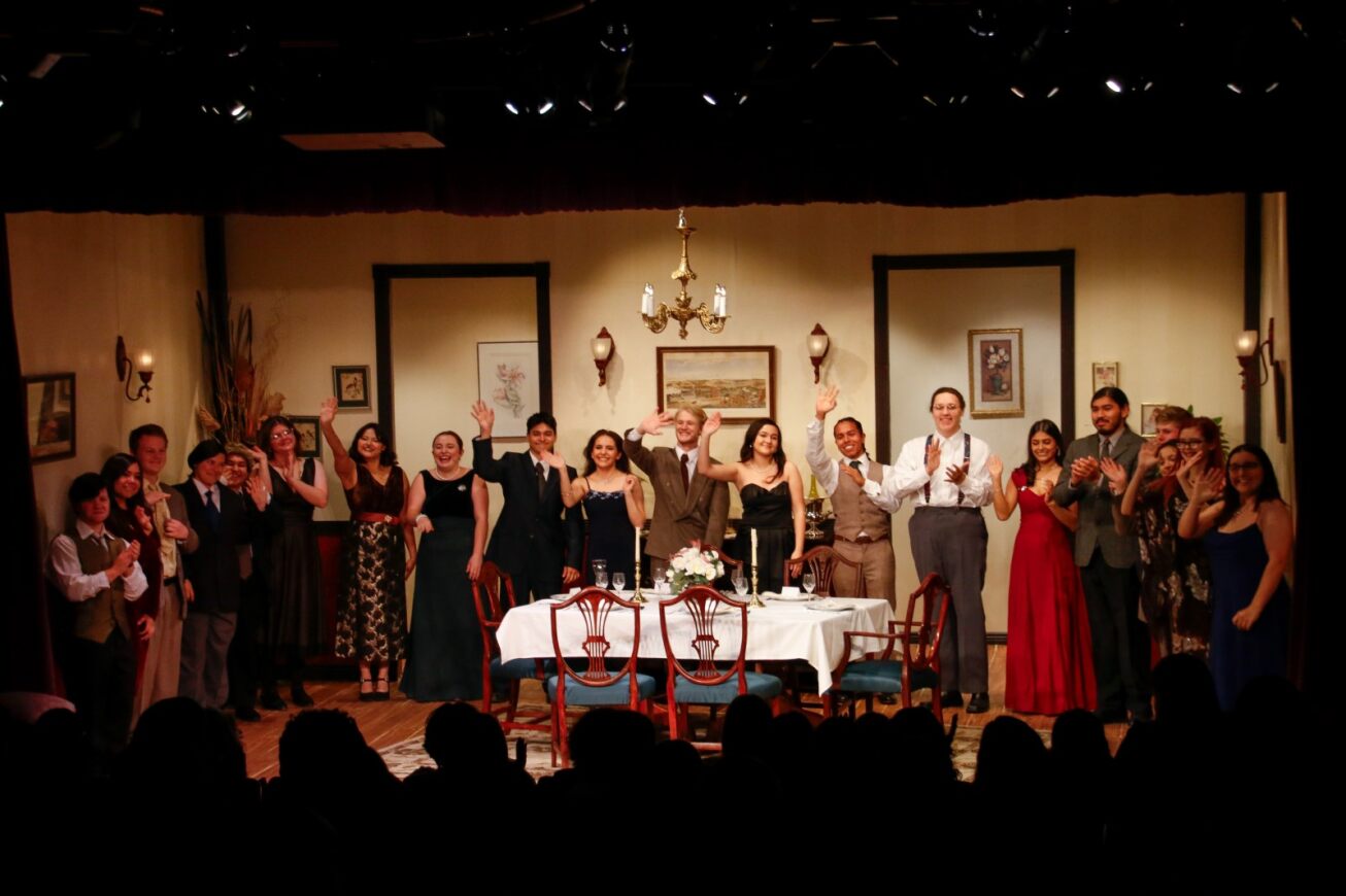 Tucson High performers stand on stage after The Dining Roon