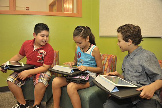 Tucson Unified students use tablets in a classroom.