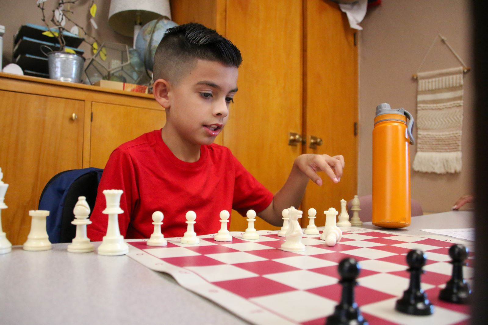 Students playing chess