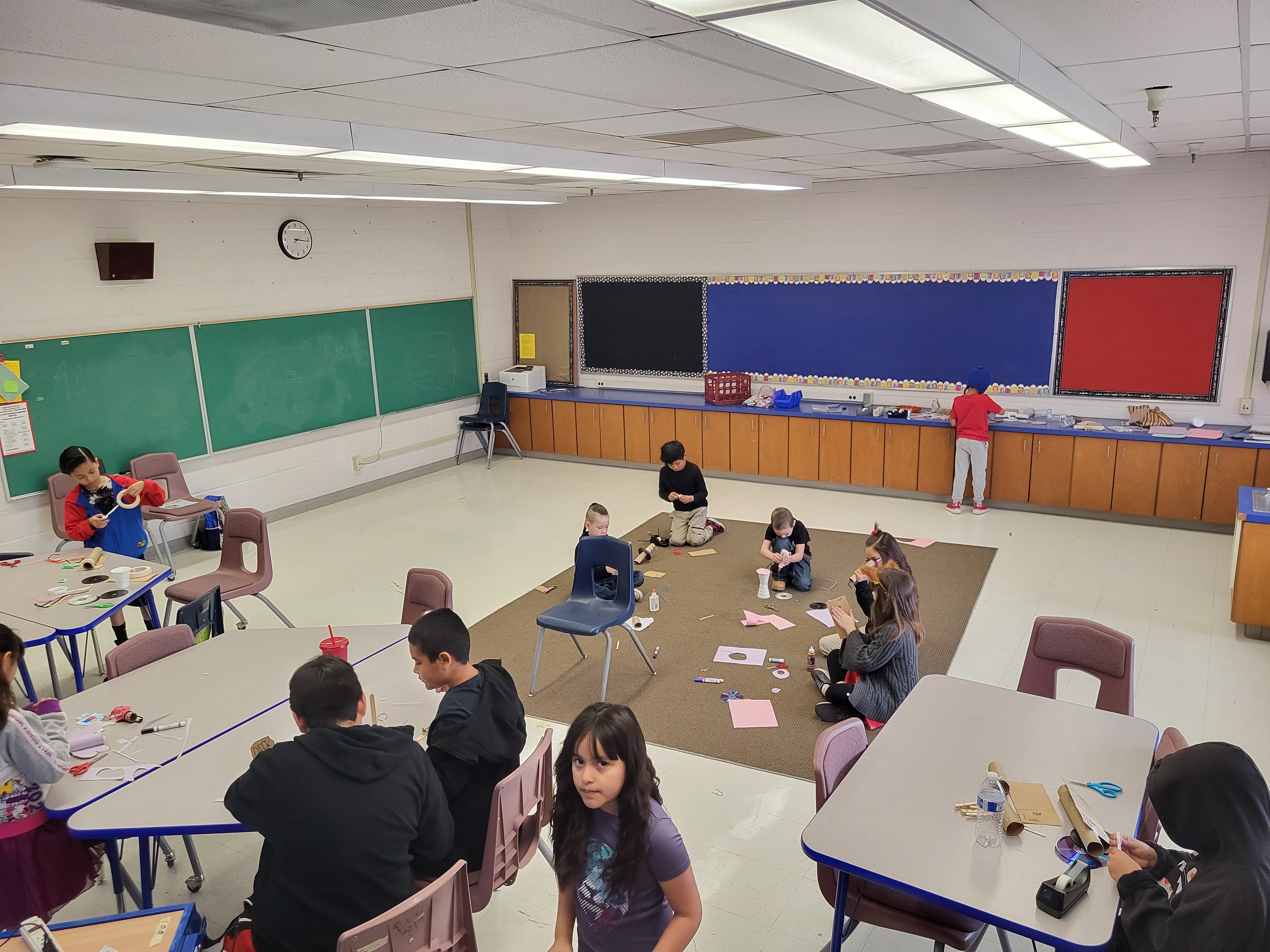 Picture of students engineering Rube Goldberg Machines