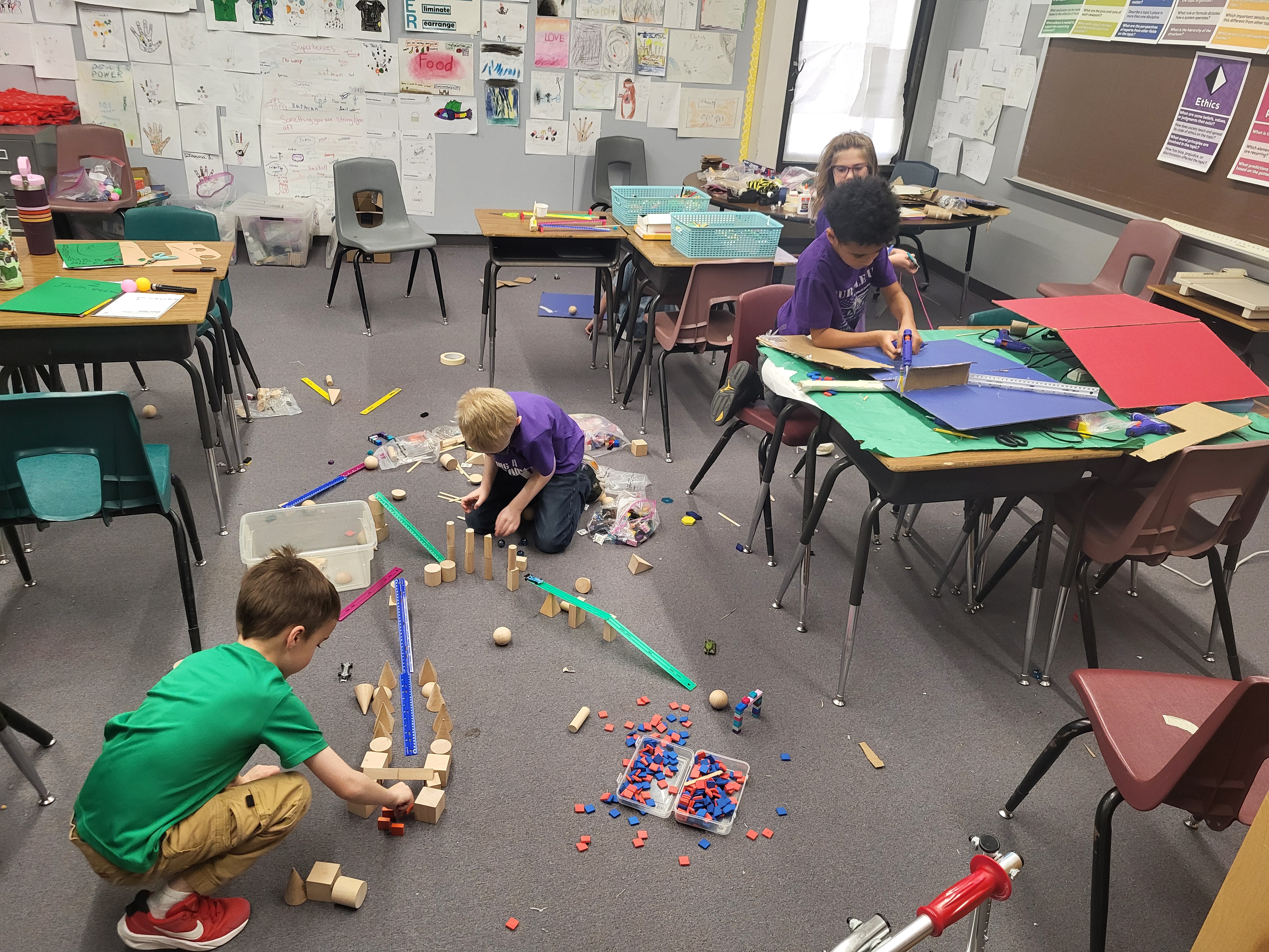 Picture of students engineering Rube Goldberg Machines