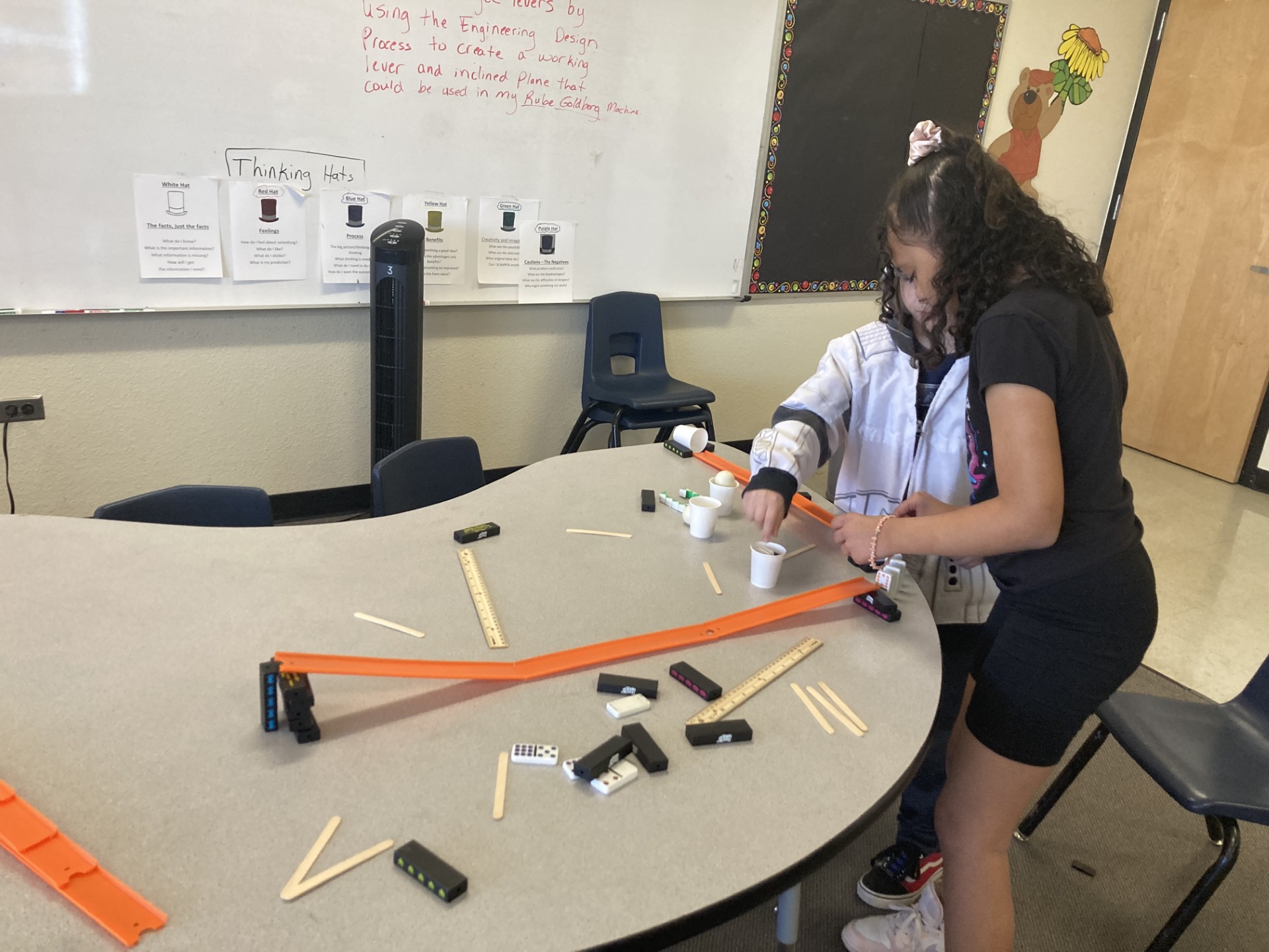 Picture of students engineering Rube Goldberg Machines