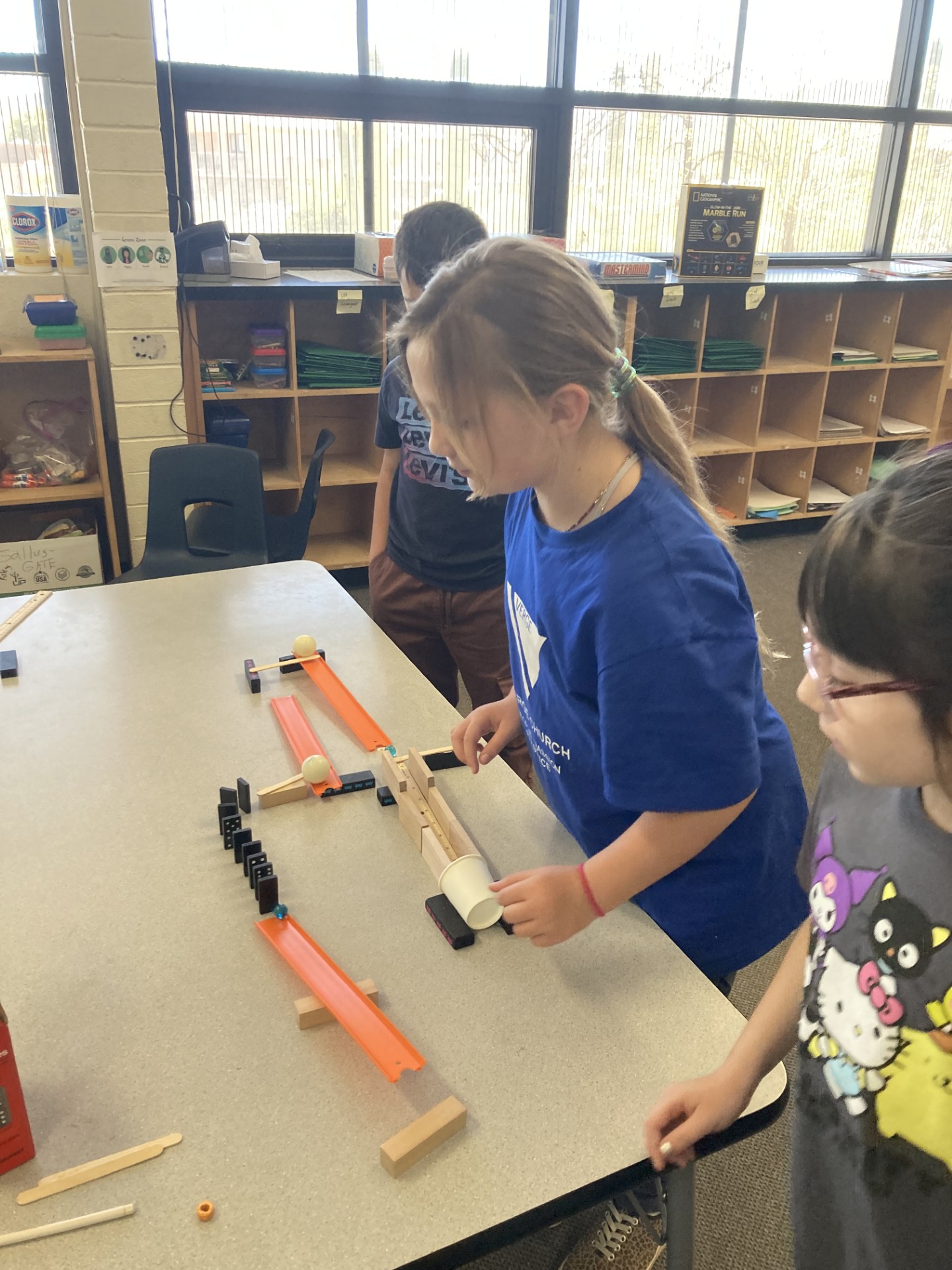 Picture of students engineering Rube Goldberg Machines