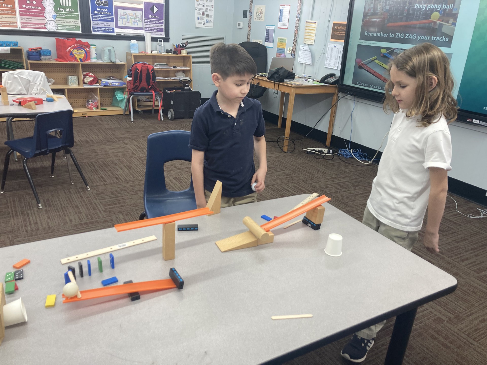 Picture of students engineering Rube Goldberg Machines
