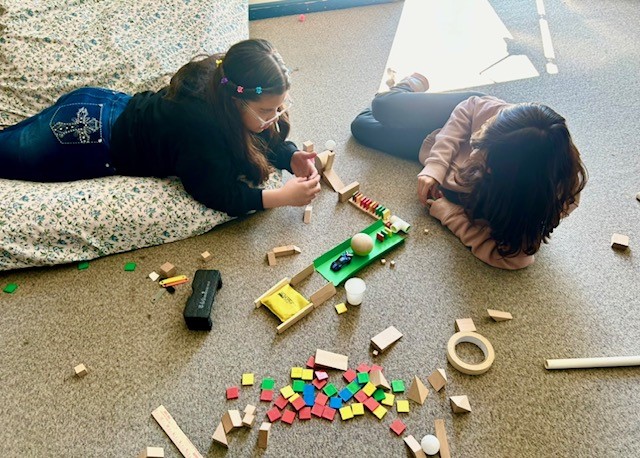 Picture of students engineering Rube Goldberg Machines