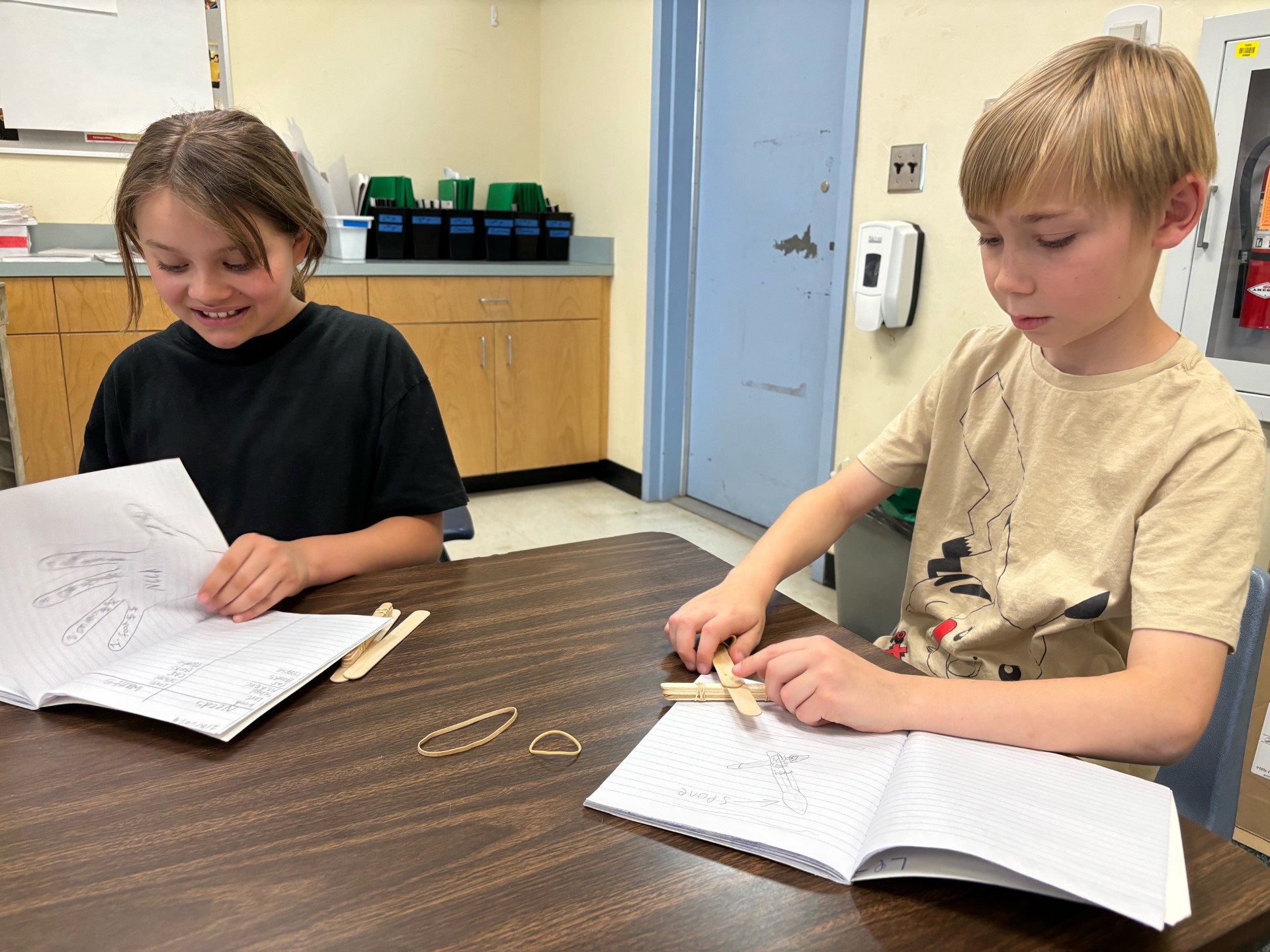 Picture of students engineering Rube Goldberg Machines