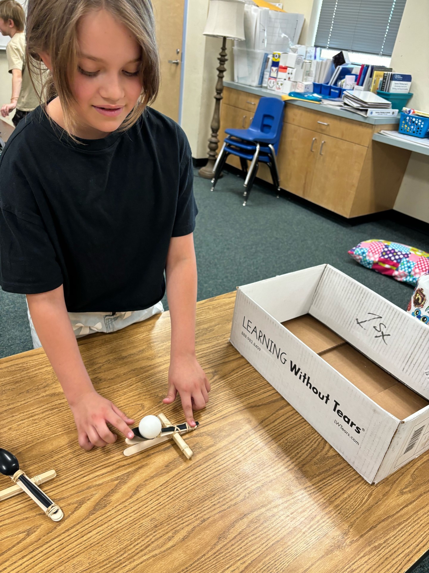 Picture of students engineering Rube Goldberg Machines