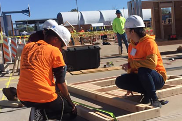 Students working on construction site