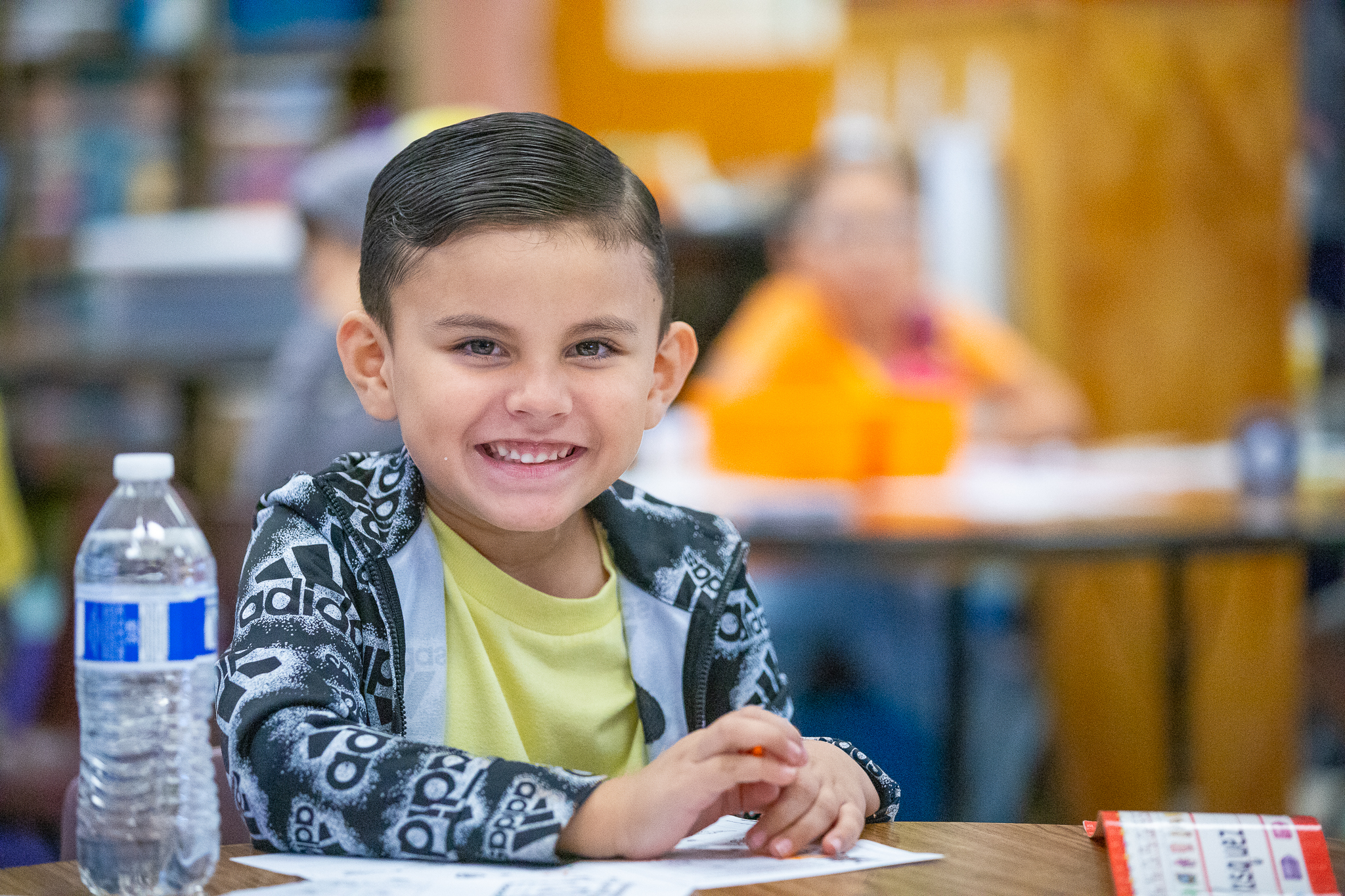 Smiling Boy in Classroom