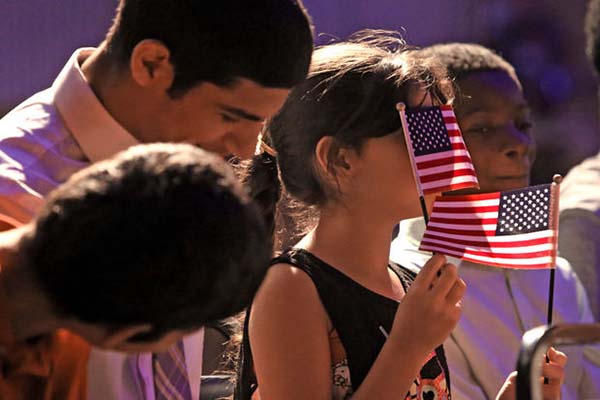 Students participate in World Refugee Day celebrations in June 2015