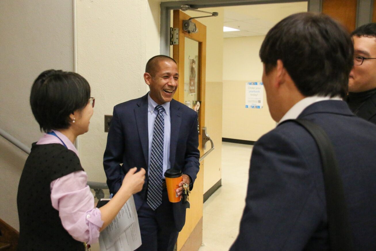 Dr. Trujillo laughs with staff from TUSD and TKAP.