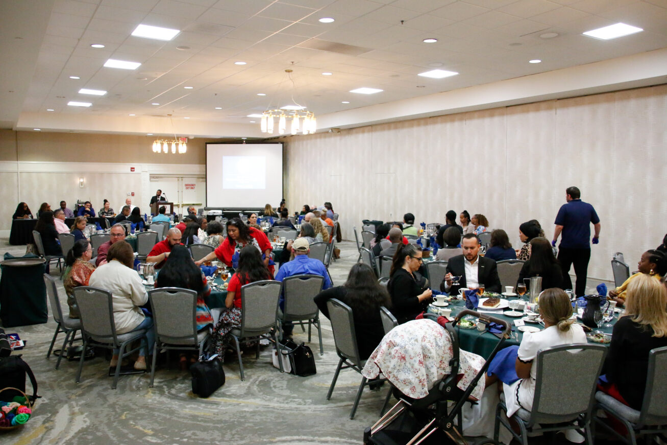 The roundtable discussion groups in the ballroom