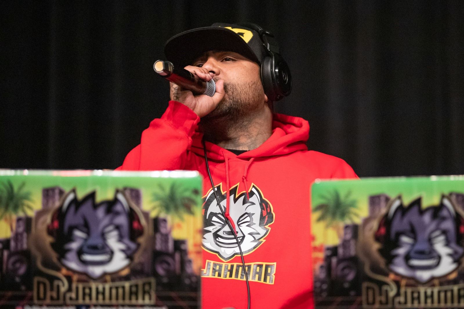 DJ Jahmar Francis performs for students at the EDI Student Summit at Santa Rita High School