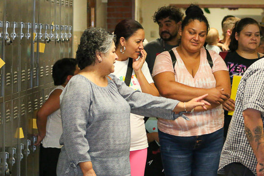 Staff leads families on a tour of the resource center.