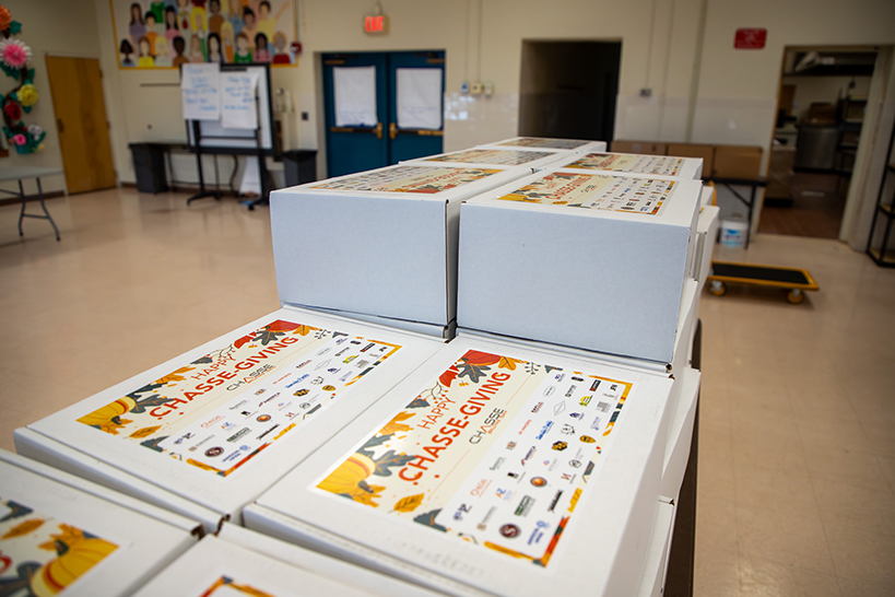 Stacks of white Giving Boxes on a table