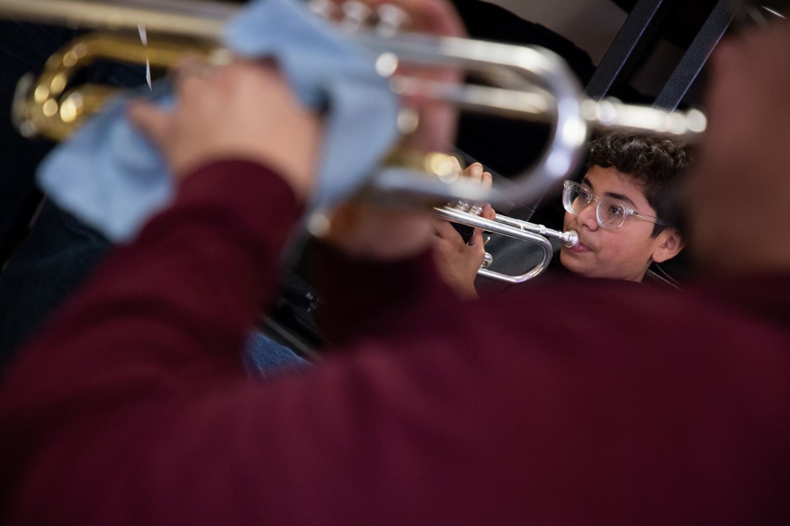Mariachi students play the trumpets
