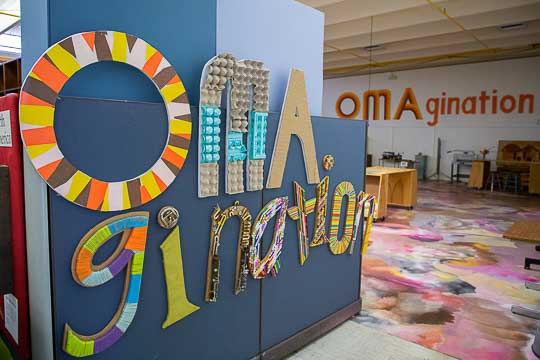 Sign of O M A gination in the center.