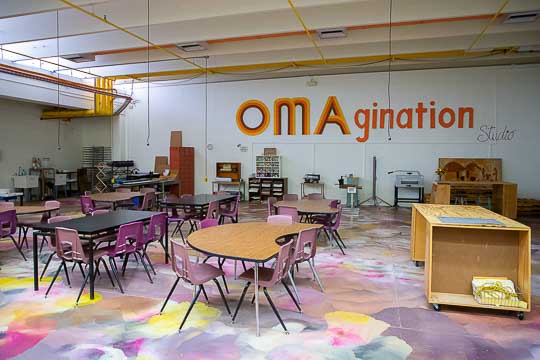 Tables and places for group activities for teachers at the center.