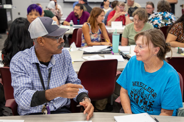 Employees gather for an interactive training session