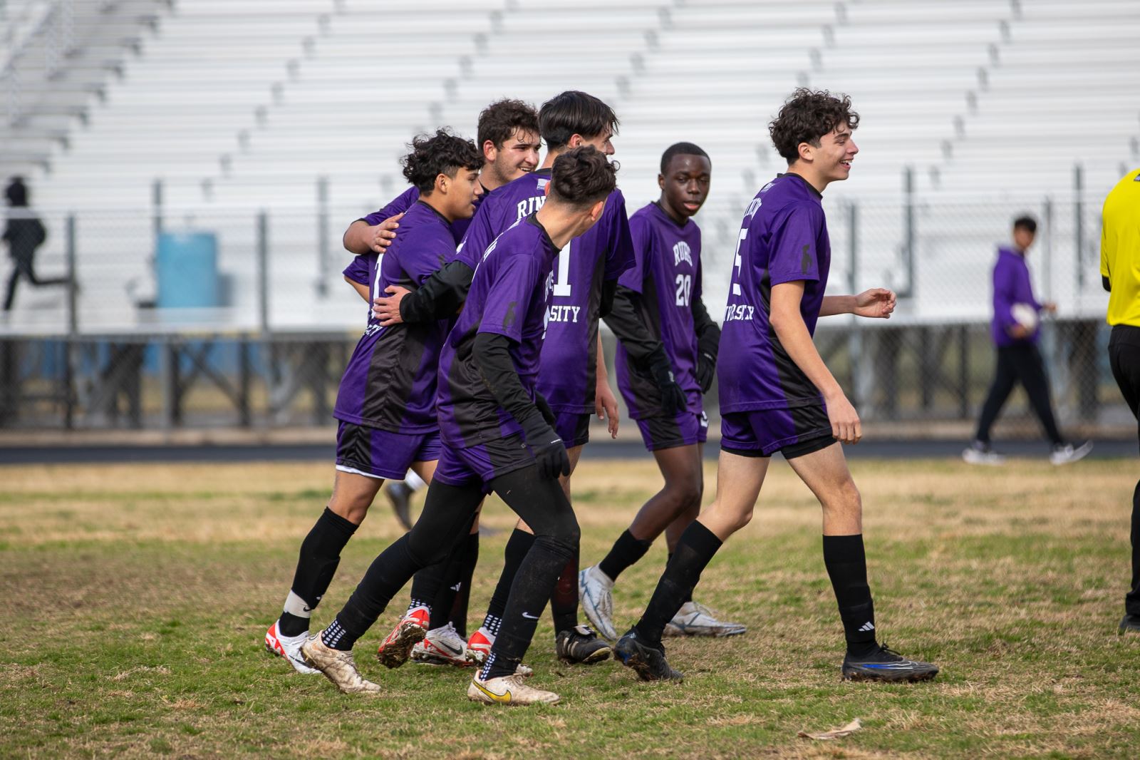 Soccer players walking as a group