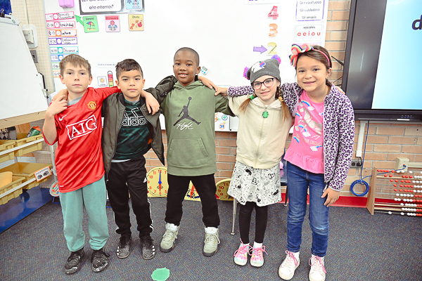 Four students posing together.
