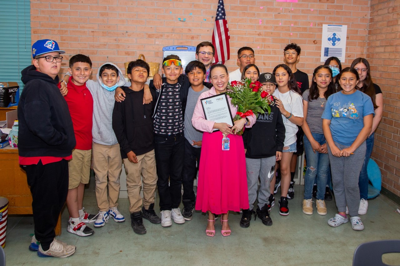 Pistor Middle School teacher Martha Isiderio was surprised with the Tucson Values Teachers Award in front of her class.