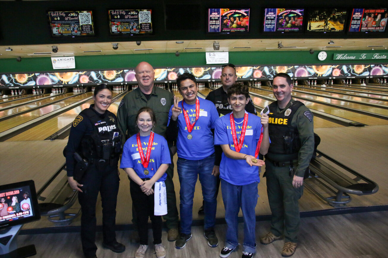 The Special Olympics bowling team poses for a photo.