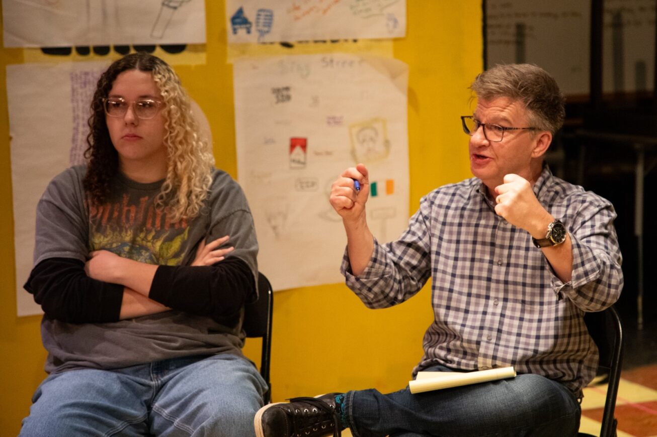 Tucson High drama teacher Art Almquist participates in a talk circle with his students.