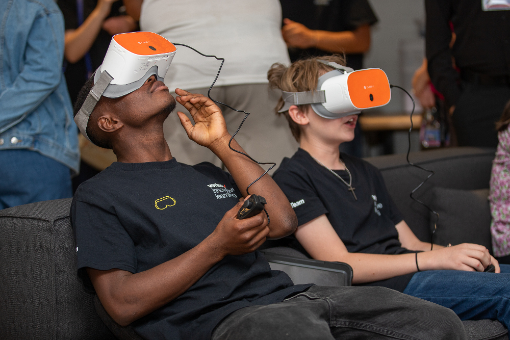 Two students use VR headsets