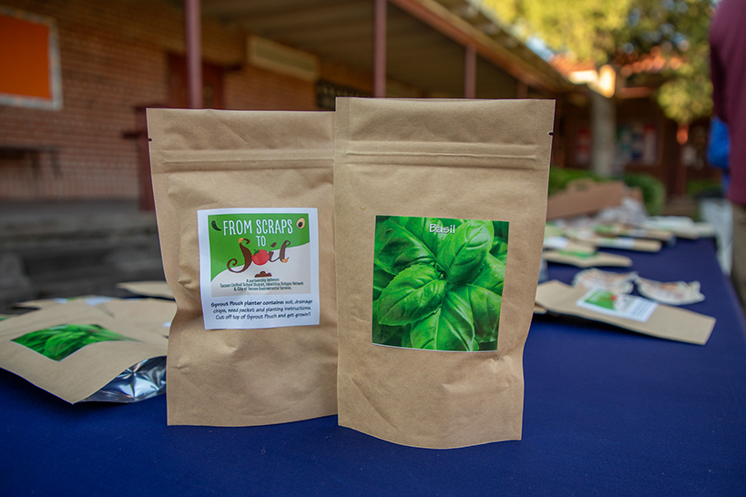 Two bags of seeds sit on a table
