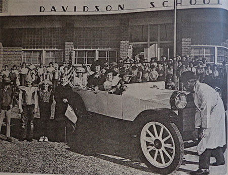 Davidson School students celebrate Arizona's 50 years of Statehood in 1962, with a truck in front of their school.