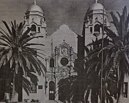 The original Safford School with palm trees in the foreground. 